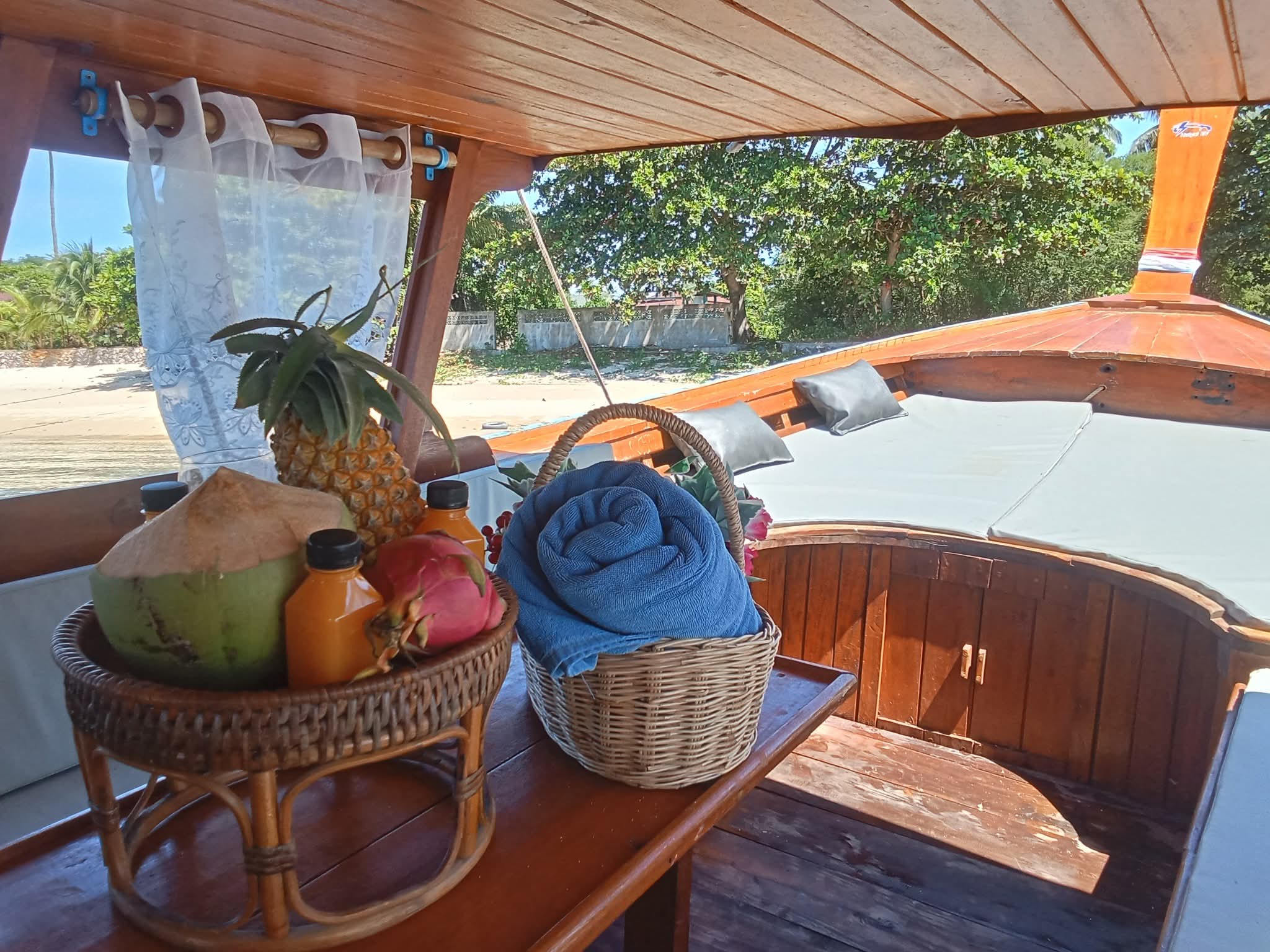 Fresh coconut, pineapple, dragon fruit and juice served onboard