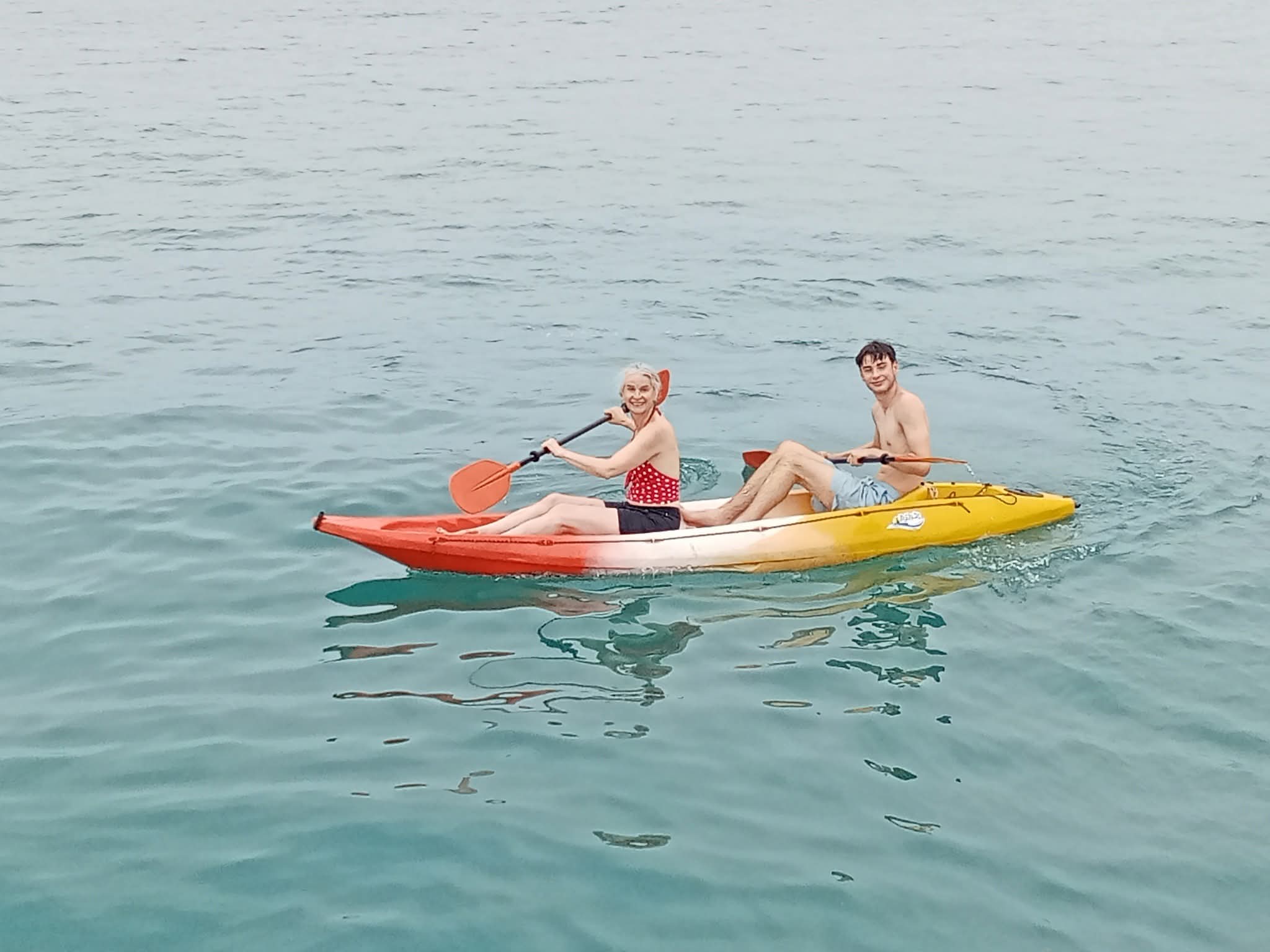 Guests tandem kayaking during the Electric Long-tail Eco Tour, Koh Samui